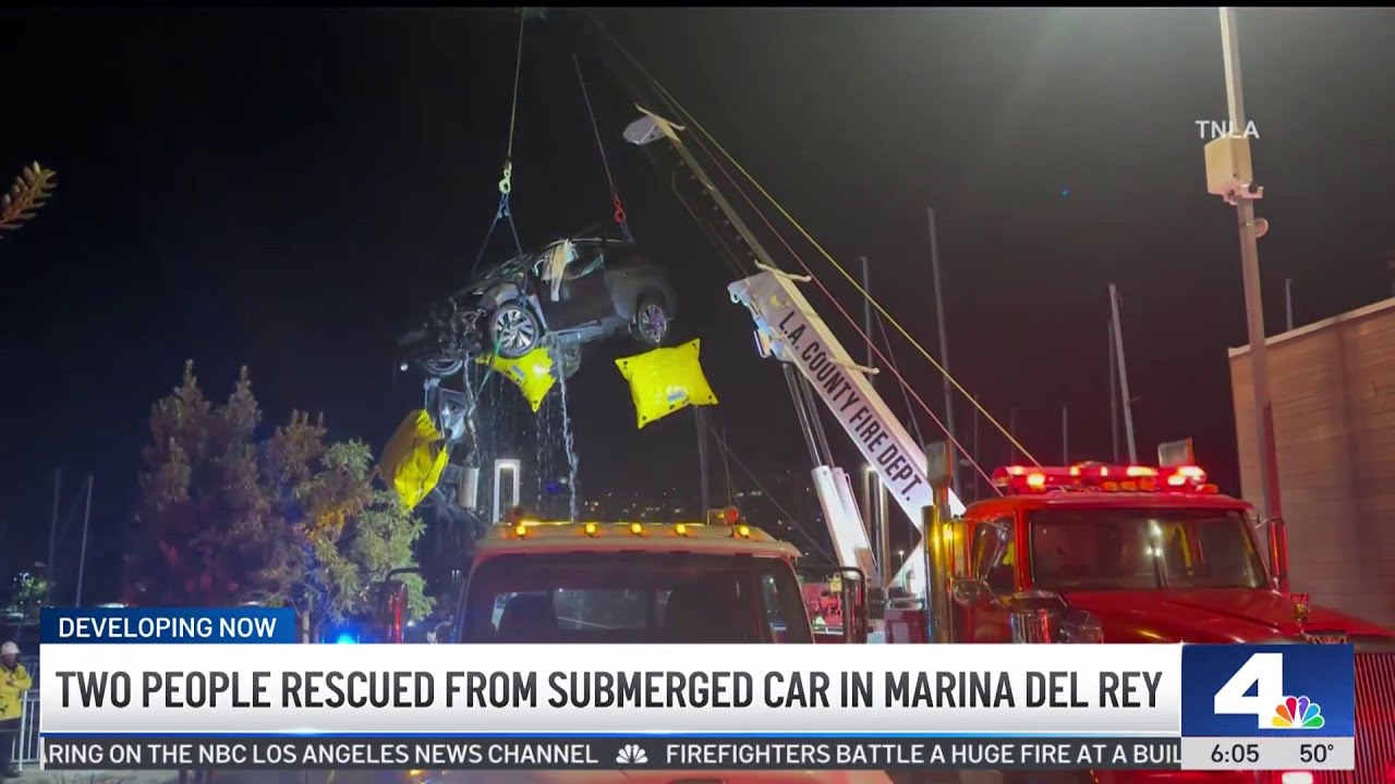 2 people rescued from submerged car in Marina del Rey - YouTube