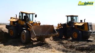 Shantui SL30W Wheel Loader Levels The Field For Military Exercises