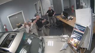 man crashes into police station blasting welcome to the Jungle by Guns and Roses