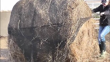 How to put hay net on a round bale