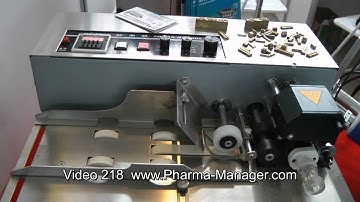 Machine for printing validity period and batch number on cardboard. Video 218 www.Pharma-Manager.com