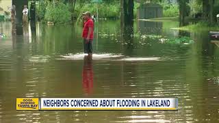 Unseasonable rains have Lakeland residents on edge as flood waters rise from drainage canal