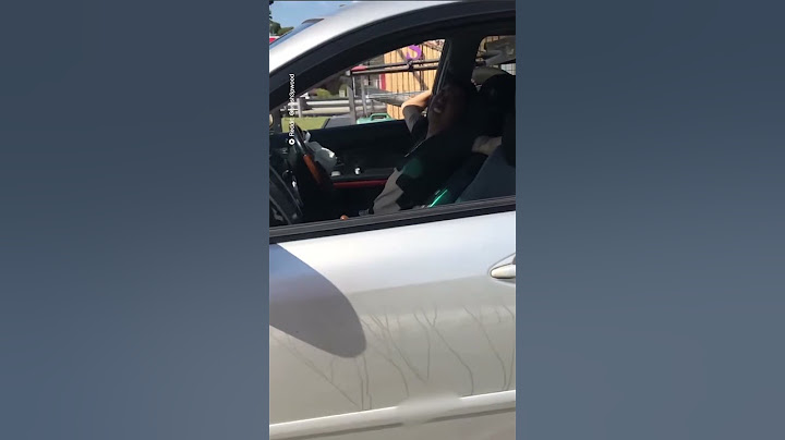 Driver seems unaware his car is wrecked