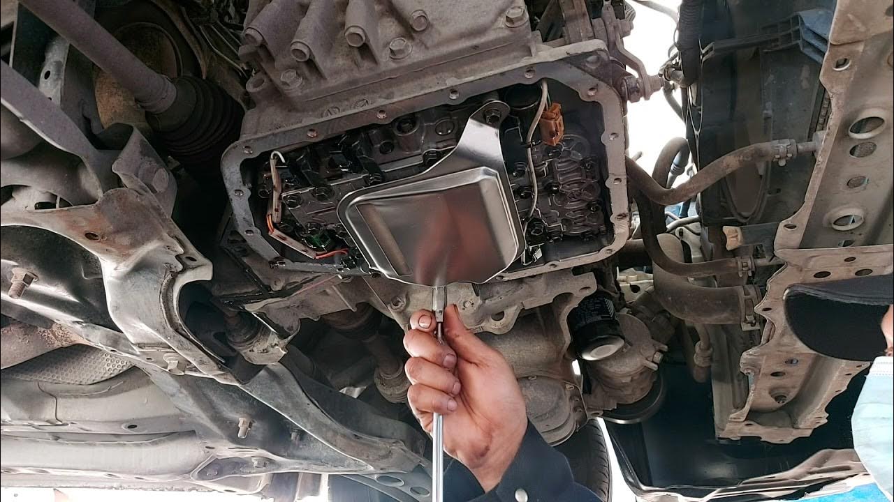 HOW TO CHANGE OIL AUTOMATIC TRANSMISSION FLUID & STRAINER toyota yaris