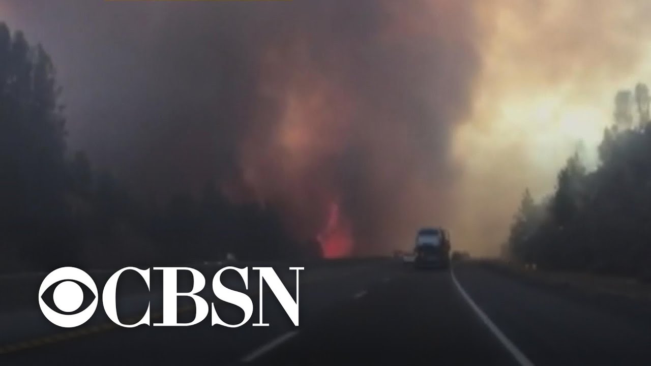 Major wildfire leaps over, shuts Calif. freeway