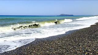 Powerful Waves on a Pebble Beach