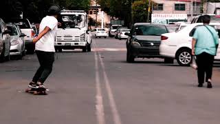 Longboard dancing step 180 , cross tep