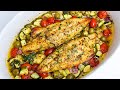 Super Easy and Flaky Baked Fish with Tomatoes and Olives.