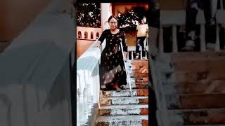 Polio Short Leg Woman Walking Down Stairs.