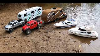 Rc BOAT LAUNCH,TRAILER CAMPER TOWED BY A RC CEN FORD RACING F450 DUALY & AXIAL JEEP.