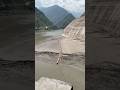 Dam level drawdown by opening the largest spillway gate to remove the stuck gate