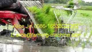 Rice transplanter 8 rows  working in the muddly field in Vietnam