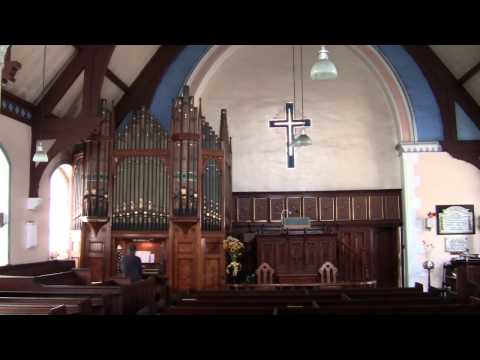 Chris Lawton at the organ of Gee Cross Methodist C...