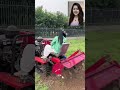 Modern Farming: Girl Plowing Field with Tractor | Efficient Soil Tilling Technique”