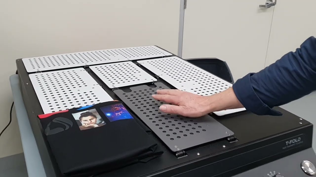 T Fold - All electric, automatic T shirt folding machine