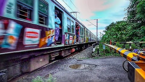 Honking Advertise printed Colourful 12 Coach vs 09 Coach EMU Local Train passing Level Crossing | ER
