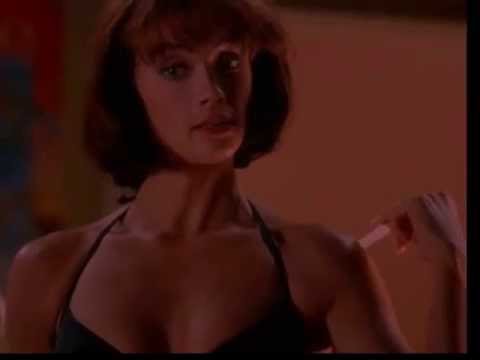 Lauren Holly in a black bikini