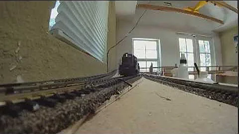 ho train layout in garden shed