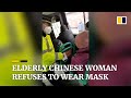 Elderly woman refuses to wear mask during coronavirus outbreak in China