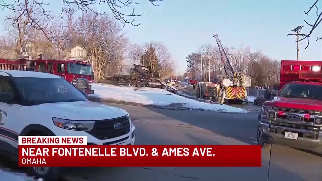 Crews battle house fire in North Omaha - YouTube