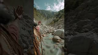 Rasta man by the river of Zion Praising GOD Almighty