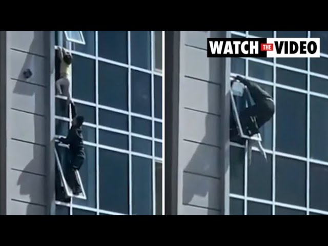 Watch: Man climbs out of window to rescue toddler hanging from 8th floor in  Kazakhstan