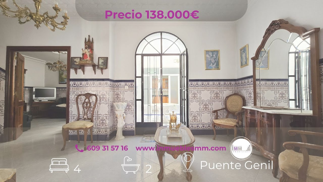 Casa cerca del centro de Puente Genil 4 habitaciones 2 baños y patio.