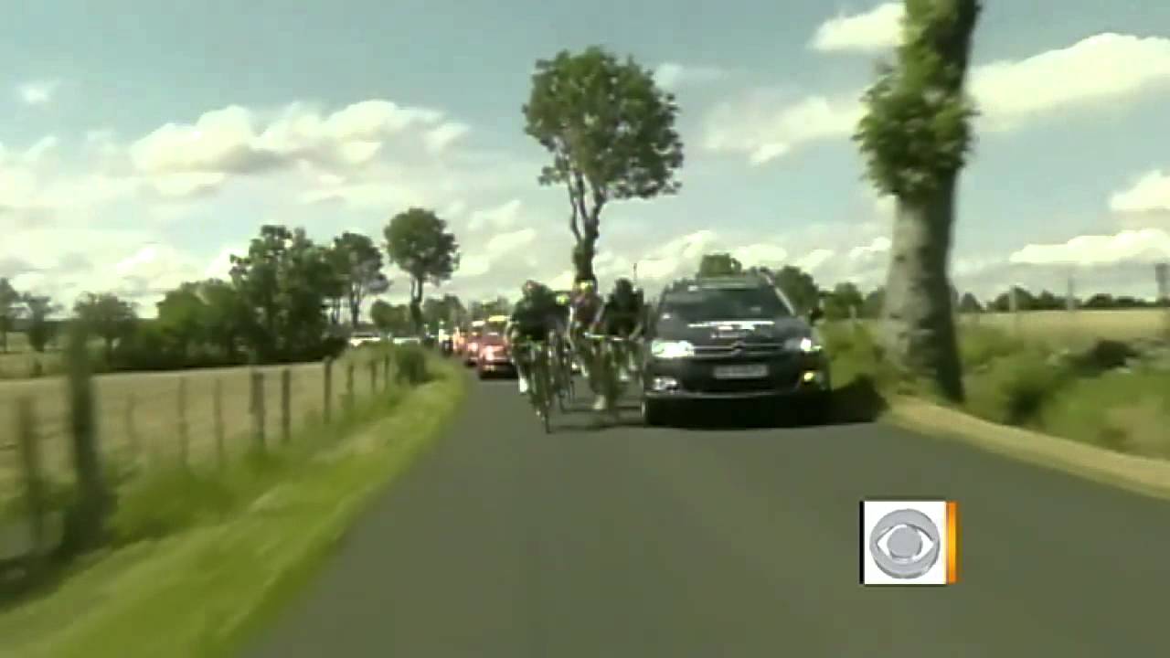 Tour de France riders clipped by news car - YouTube