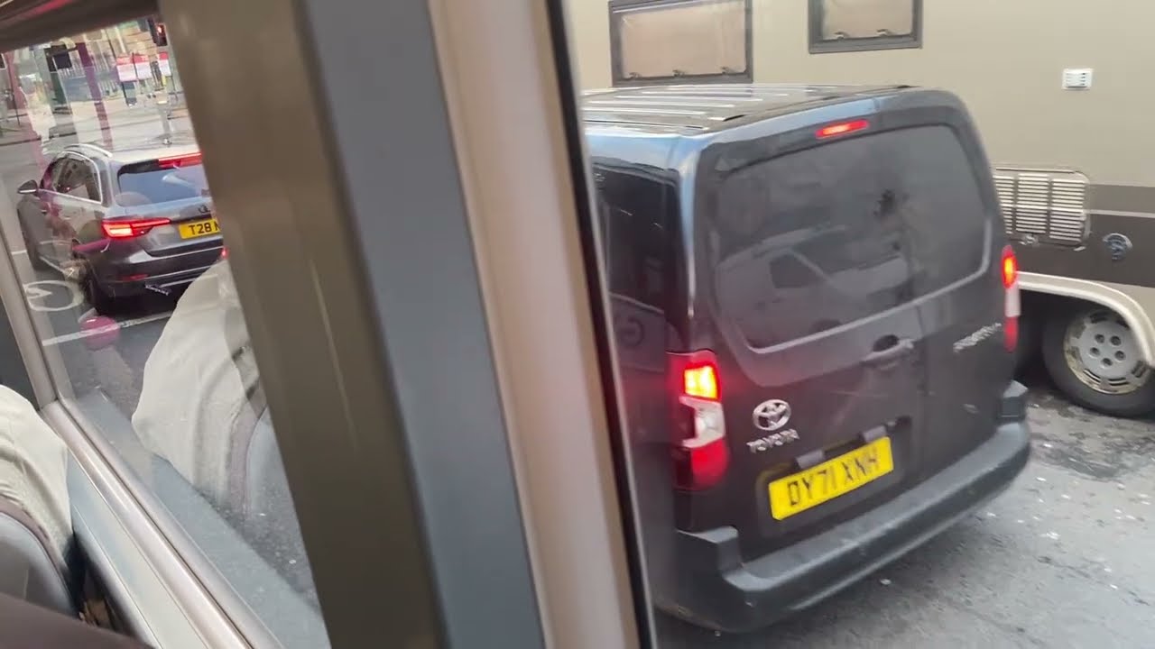 First Glasgow Enviro 200 EV 64187 LG23EYB on the 77 from Buchanan Bus Station to Glasgow Airport