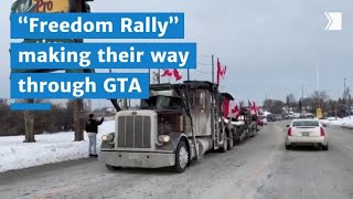 Truckers with the “Freedom Rally” make their way through the GTA’s main roadways