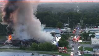 Drone shows massive south Toledo fire as two workers remain missing