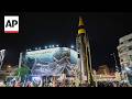 Iran displays what looks like a ballistic missile launcher at rallies