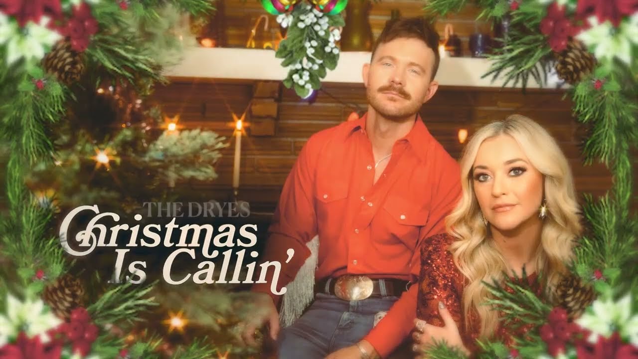 Download/Stream here:
https://cmdshft.ffm.to/christmasiscallin

CHRISTMAS IS CALLIN’
Written by Derek Drye, Katelyn Drye & Kelli Johnson
Lyric video by Austin Simmons

Got biscuits in the oven 
I got some good lovin’
Amy Grant on the vinyl
Singin’ stories from the bible

And I'm hoping and prayin’
That we’ll get snowed in
With those flakes just a fallin’
Oh Christmas is callin’

Whether you’re high class or low class
You can put a little cheer in your glass
Sing those songs around the fire
Jingle juice makes you smile little brighter

We all got special memories
Crazy traditions with our family
A little peace on earth sounds good to me 
Holly jolly,  Deck the hallin’
Christmas is callin’

We’ll have a little get together 
Bring your uncle’s ugly sweater
I like the ones with tassels hangin’
From places we ain't namin’

Kids wishing on a wishlist 
We’re all waiting on St. Nick  
Silver bells and winter walkin’
Christmas is callin’

Whether you’re high class or low class
You can put a little cheer in your glass
Sing those songs around the fire
Jingle juice makes you smile little brighter

We all got special memories
Crazy traditions with our families
A little peace on earth sounds good to me 
Holly jolly, Deck the hallin’
Christmas is callin’