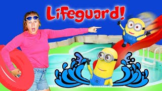 assistant trains how to be a lifeguard with minions at the waterpark