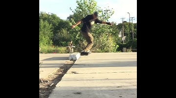 classic mizou grind on a curb...