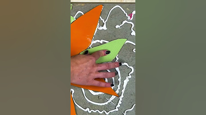 From Chaos to Art: Witness a Woman Breaking Tiles for a Striking Pattern #shorts