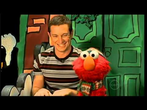 Rove visits Elmo on the set of Sesame Street, New ...
