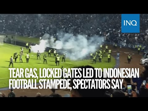 Tear gas, locked gates led to Indonesian football stampede, spectators say