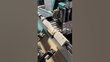 The automatic feeding CNC wood lathe processing center can process wooden table legs, chair legs。