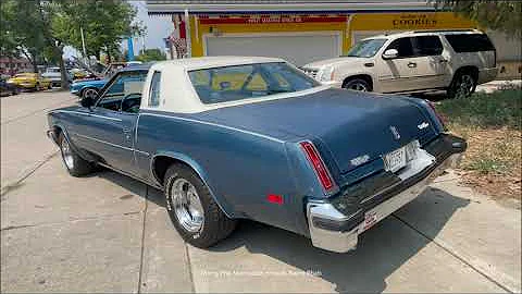 A Blue/White 1977 Oldsmobile Cutlass Supreme