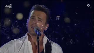 Download lagu Nikos Vertis - An eisai ena asteri LIVE and Lyrics