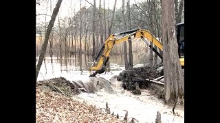 Breaking Beaver Dam on 10 Acre Pond! Flooded Excavator Trackhoe Caterpillar Digging out Mud Busting