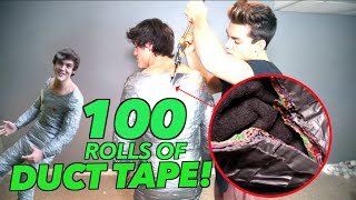 wrapped in 100 rolls of duct tape 100 layers challenge