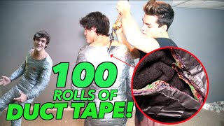 WRAPPED IN 100 ROLLS OF DUCT TAPE!! (100 layers CHALLENGE)