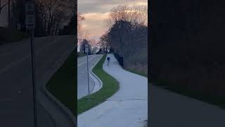 Boy Falls While Skateboarding Downhill on Roadside - 1495152