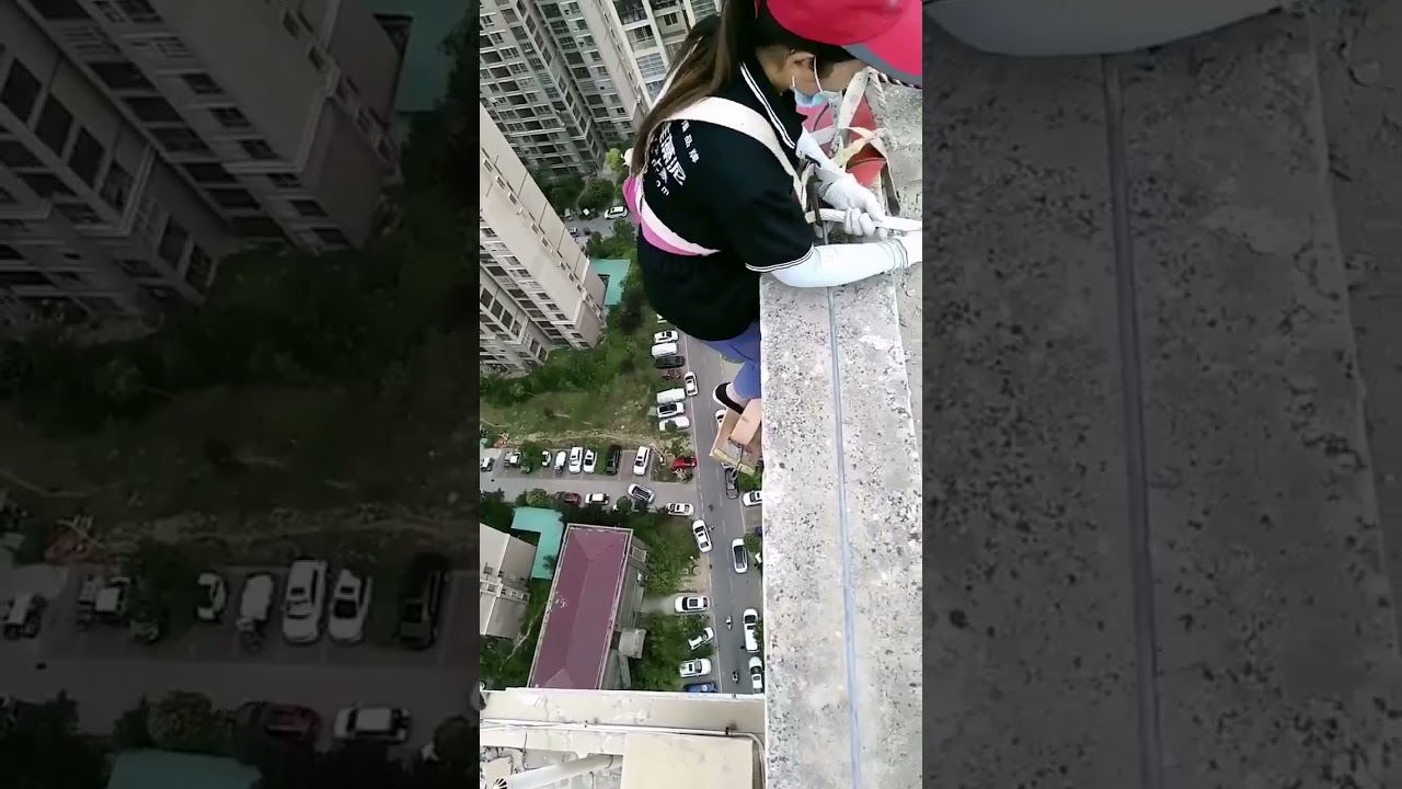 Hard Working Woman doing  Dangerous Job