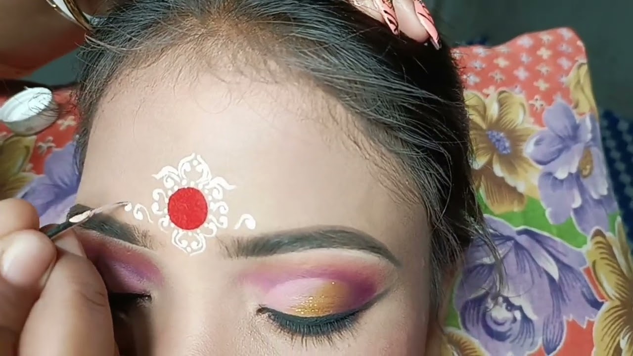 Bridal chandan art for Bengali bride