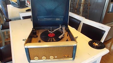 MOTOROLA CALYPSO record player playing a 78 RPM record.