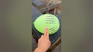 Experiment: Will a water balloon explode if it rolls down from a tall building? 💥🎈 #balloon