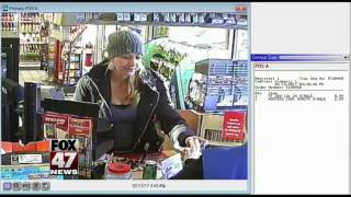 Police looking for woman accused of using counterfeit money